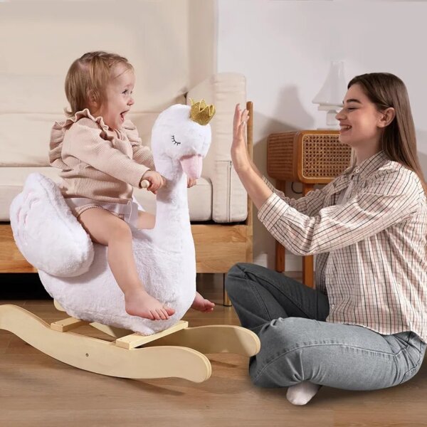 Rocking swan with doll